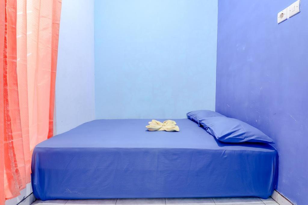 Pinky Guest House Syariah Kota Batu Бату Екстериор снимка